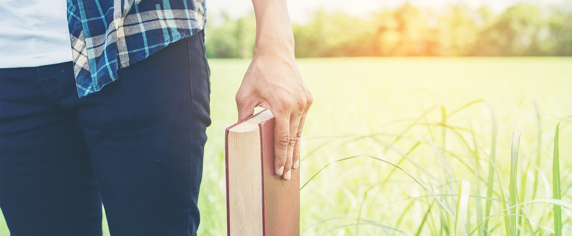 Aidan-University-Bachelor-Degree-Biblical-Theological-Ministerial-Studies-young-male-students-holding-a-bible